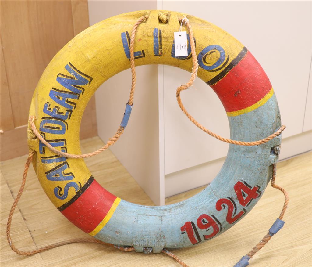 A lifebuoy inscribed Saltdean 1924, diameter 88cm